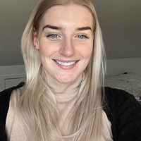 A headshot of Brooke Taylor