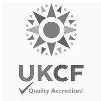 Star shape with UKCF name and a tick with the Quality Accredited wording