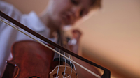 Boy playing the cello