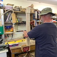  A man making an archery bow