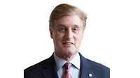 A headshot of James Newman OBE FCA FCT
