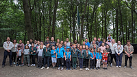 A group of young scouts in the woods